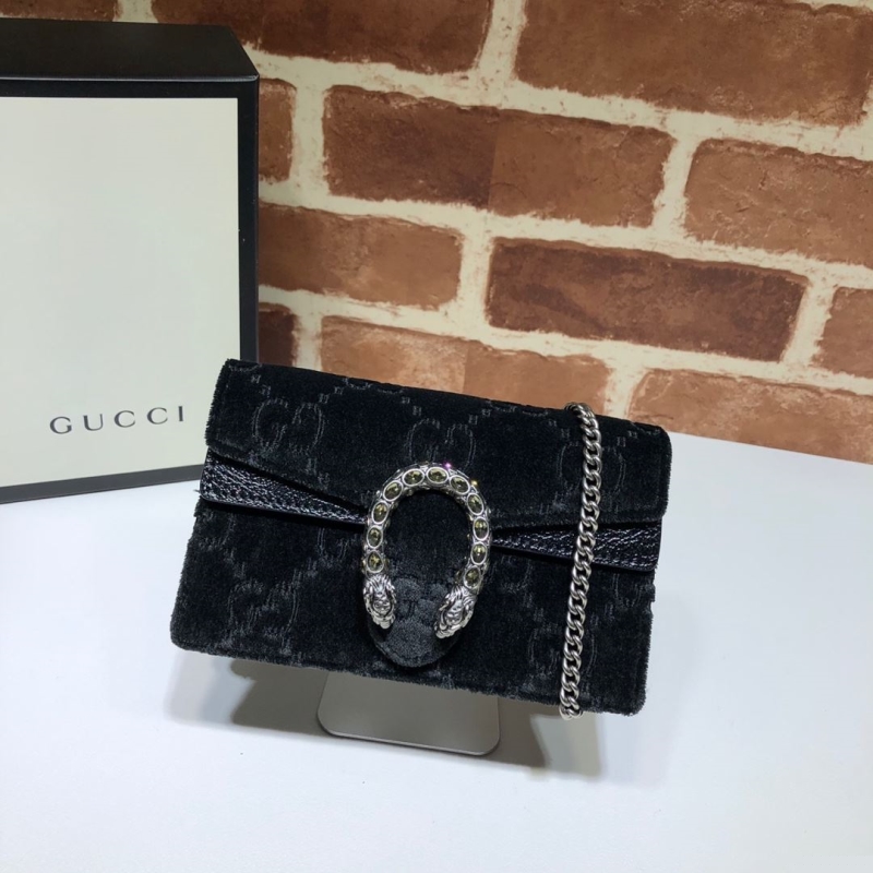 G*u*i top handle bags